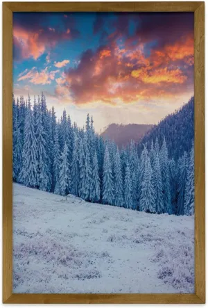 Ambesonne Nature Framed Wall Art, Winter Snowy Mountain Valley with Pines Sunset Sky Idyllic Landscape, Fabric Poster with Walnut Tone Wood Frame Home Dorm Decor, 23" x 35", Sky Blue Salmon